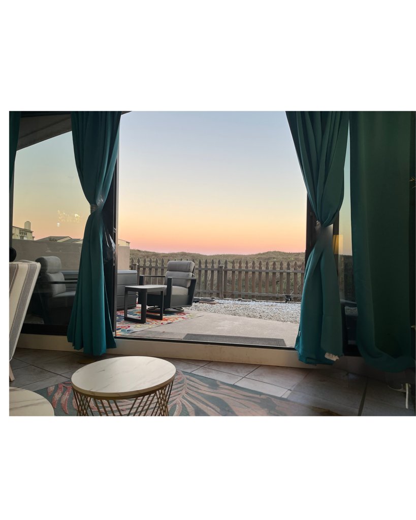 Sunset through the 3-panel Florida window wall